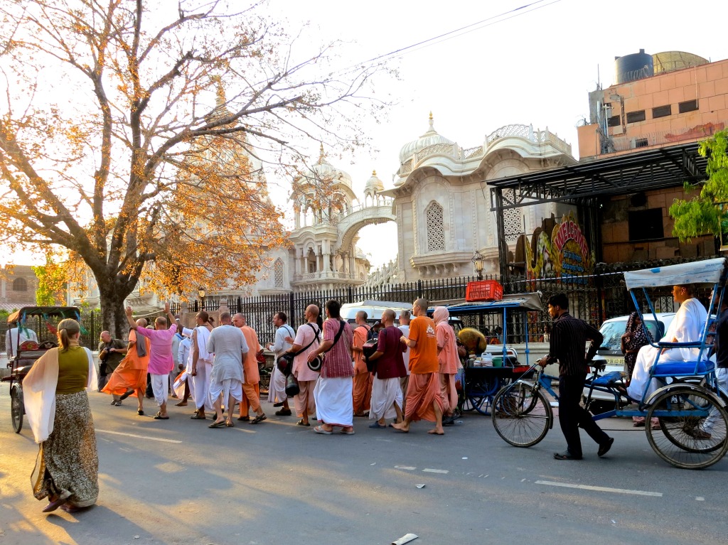 Hare krishnas dance and chant outside of Krishna Balaram Mandir, ISKCON's principal temple in Vrindavan, India