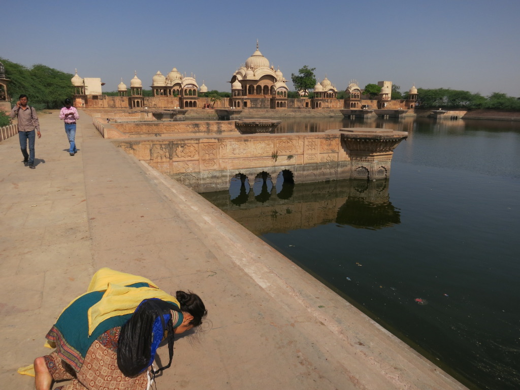 Sita dasi praying during Parikrama pilgrimage to Govardhan Hill in Uttar Pradesh, India