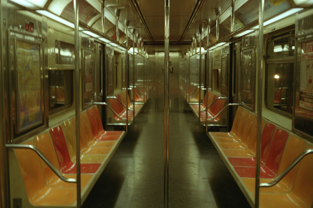 Reflections on the 1 train. (Alexander Rabb / Flickr)